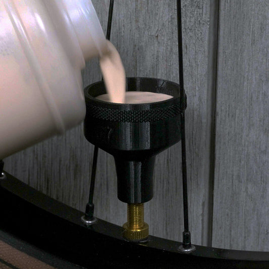 Sealant Funnel for filling tubeless bicycle tires with tire sealant.  Alternative to tire sealant injector.
Miles Wide Industries Schrader Valve