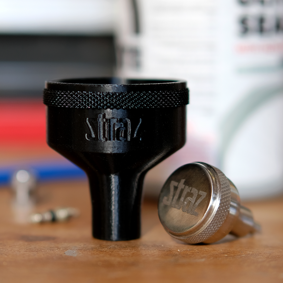 STRAZ Tubeless Essentials Bundle showing Sealant Funnel and Valve Core Remover for bicycle tubeless tire maintenance