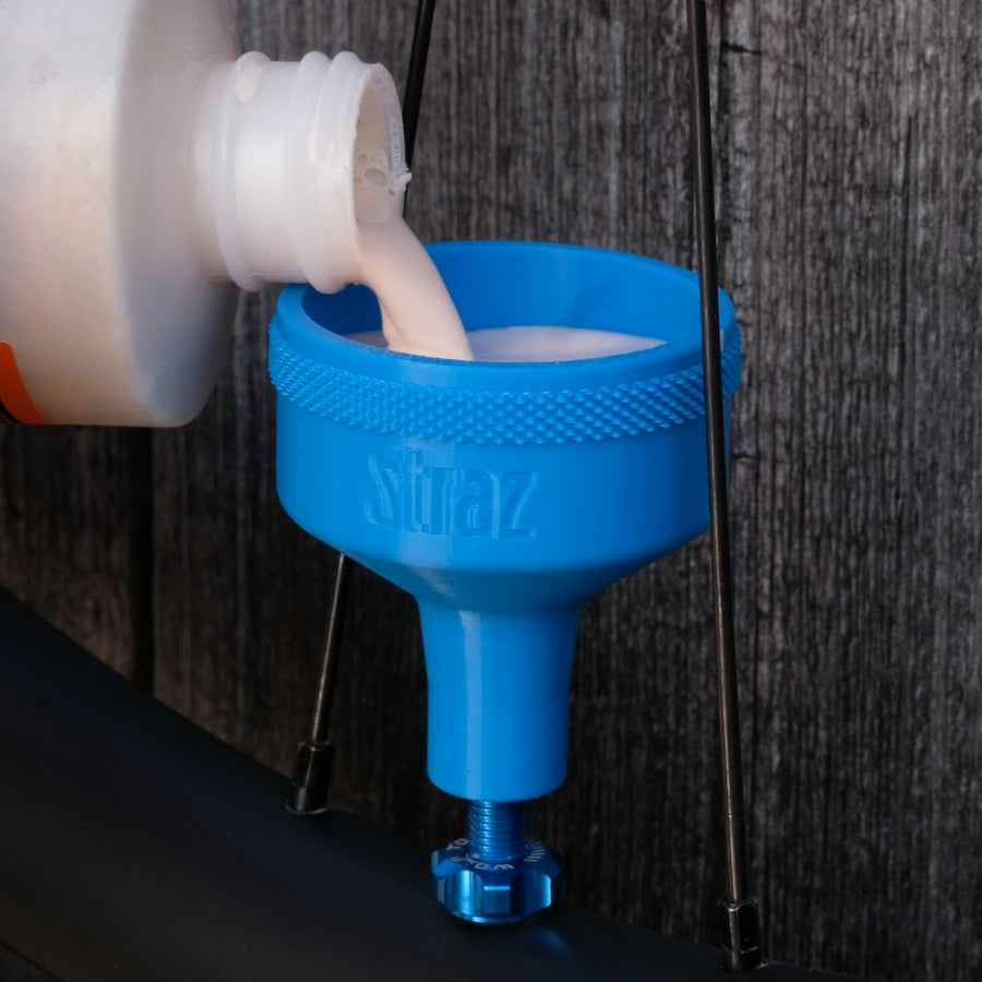 Sealant Funnel for filling tubeless bicycle tires with tire sealant.  Alternative to tire sealant injector.