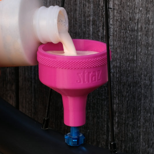 Sealant Funnel for filling tubeless bicycle tires with tire sealant.  Alternative to tire sealant injector.